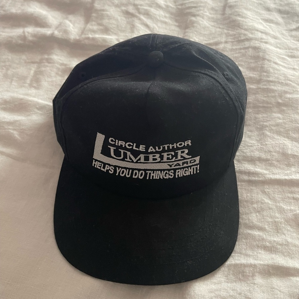 Circle Author Lumber Yard Unstructured Black Snapback Hat